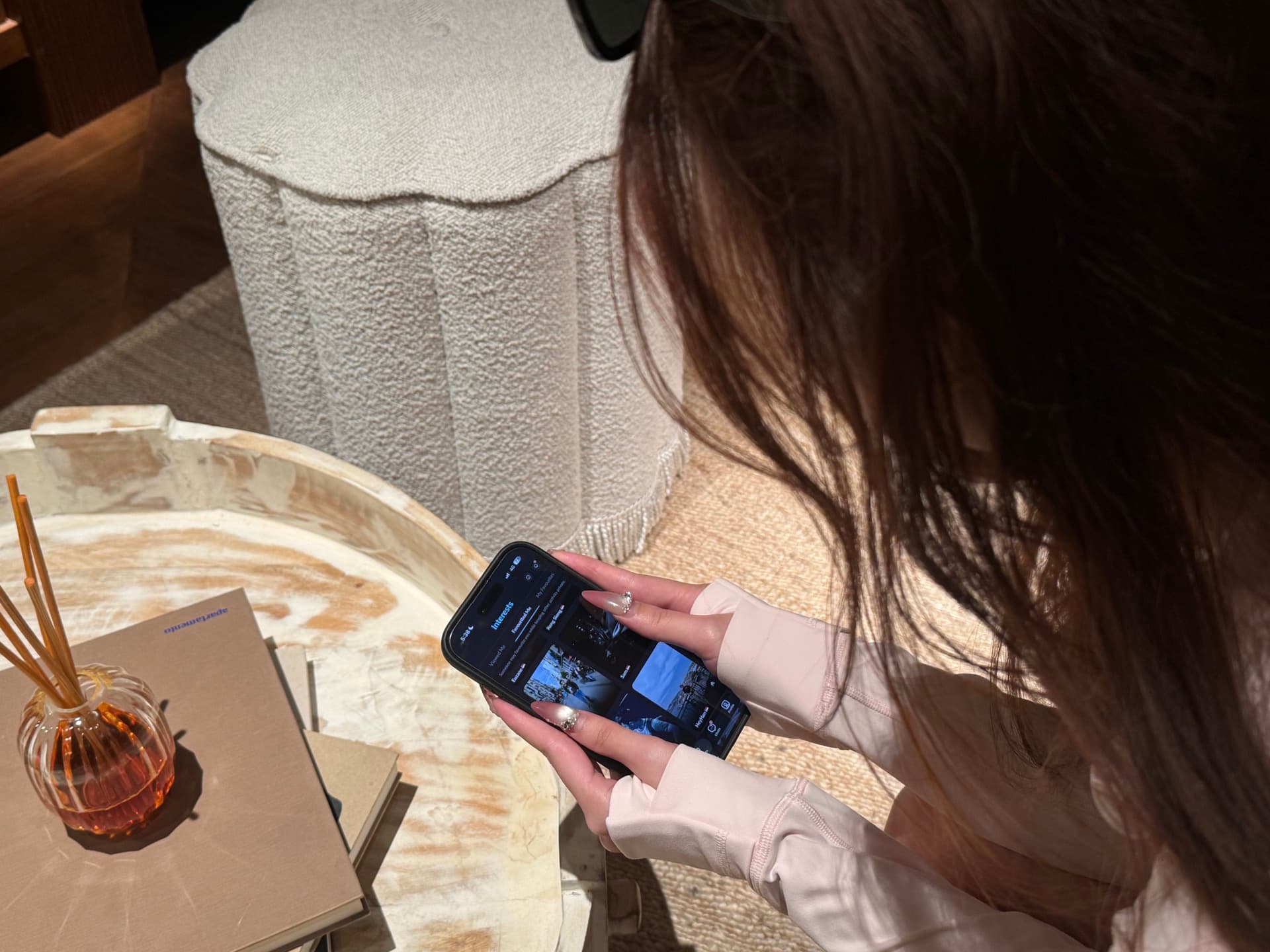 A woman using MatchCatch privately on her phone